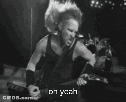A Man Is Playing A Guitar In A Black And White Photo And Says `` Oh Yeah '' . GIF