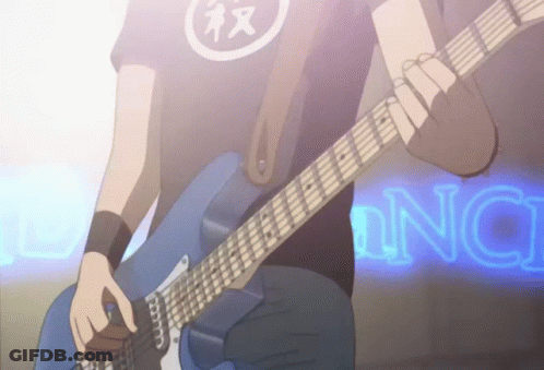 A Man Is Playing A Guitar In Front Of A Neon Sign That Says " Nc " GIF