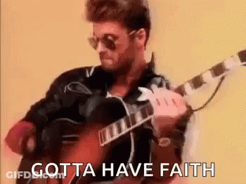 A Man Is Playing A Guitar With The Words `` Gotta Have Faith '' Behind Him . GIF