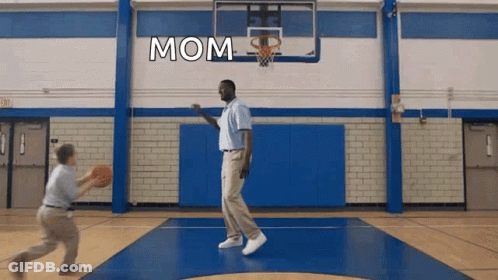 A Man Is Playing Basketball With A Child And The Word Mom Is On The Wall GIF