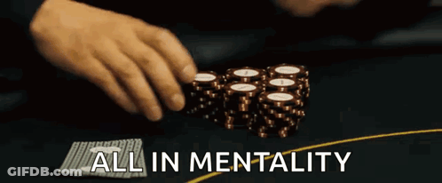 A Man Is Playing Poker And The Words All In Mentality Are Written Above Him GIF