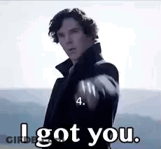 A Man Is Pointing At The Camera And Saying `` I Got You '' . GIF