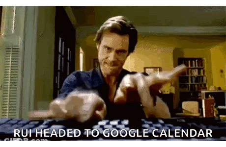 A Man Is Pointing At The Camera While Typing On A Keyboard And Says `` Rui Headed To Google Calendar '' . GIF