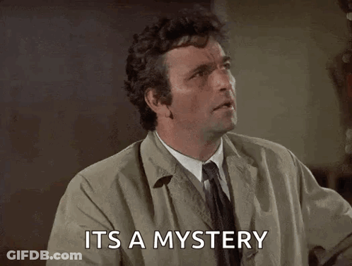 A Man Is Pointing Up And Saying `` It 'S A Mystery '' With His Finger . GIF