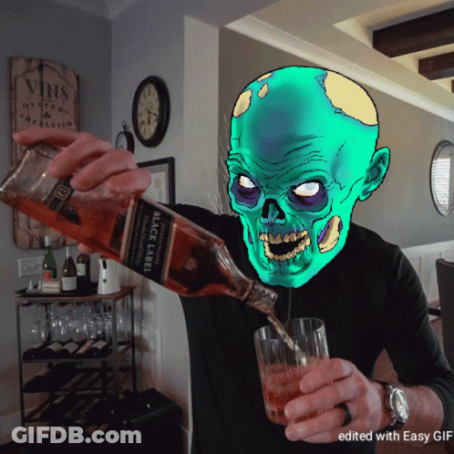 A Man Is Pouring A Bottle Of Black Label Scotch Into A Glass GIF