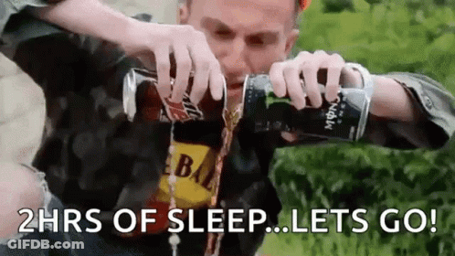 A Man Is Pouring Energy Drink Into His Mouth . GIF