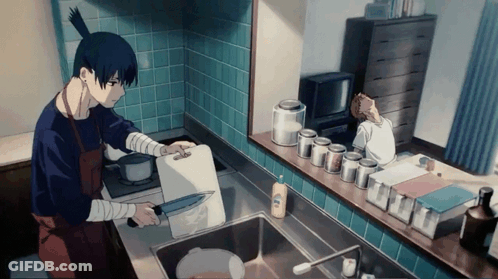 A Man Is Preparing Food In A Kitchen With A Knife And Cutting Board GIF