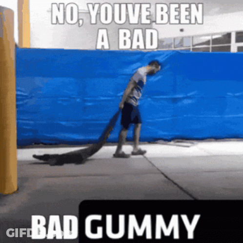 A Man Is Pulling A Rope With The Words No Youve Been A Bad Bad Gummy Below Him GIF