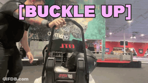 A Man Is Pushing A Jtd Helmet Up A Ramp GIF