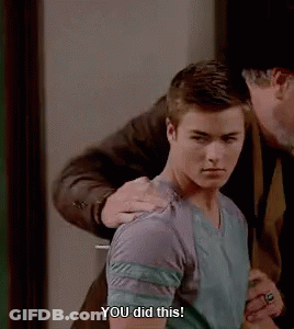 A Man Is Putting His Hand On A Young Man 'S Shoulder And Saying `` You Did This '' . GIF