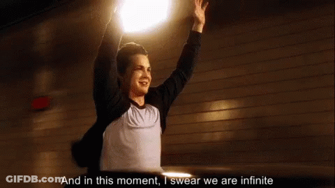 A Man Is Raising His Arms In The Air And Saying `` And In This Moment , I Swear We Are Infinite '' GIF