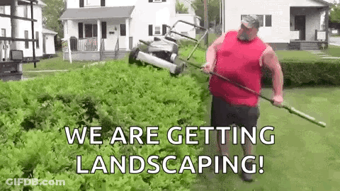 A Man Is Raking A Lawn With A Rake In His Backyard . GIF