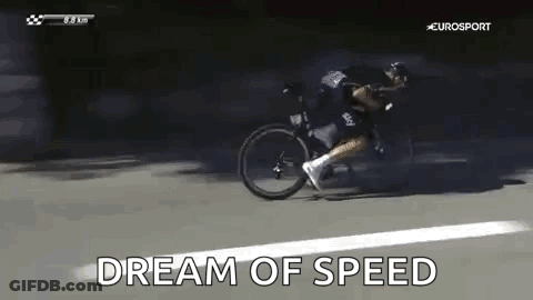 A Man Is Riding A Bicycle Down A Road And The Words `` Dream Of Speed '' Are Being Displayed . GIF
