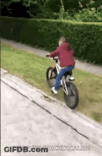 A Man Is Riding A Bike Down A Road With The Words Recover Quickly Caleb Written Below Him GIF