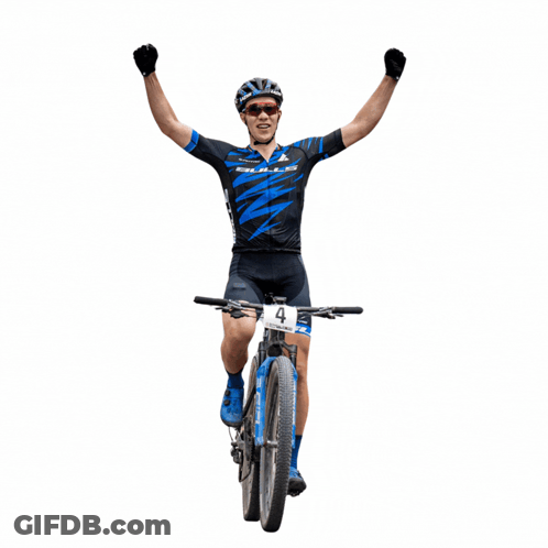 A Man Is Riding A Bike With The Number 4 On It GIF