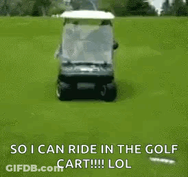 A Man Is Riding A Golf Cart On A Golf Course With A Golf Bag On The Back . GIF