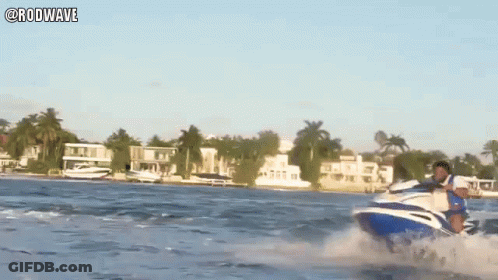 A Man Is Riding A Jet Ski In The Ocean With The Hashtag Rodwave GIF