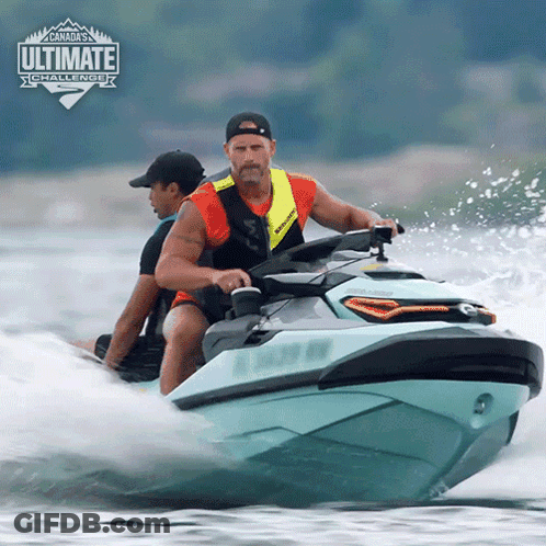 A Man Is Riding A Jet Ski In The Water With The Words Canada 'S Ultimate Challenge Behind Him GIF
