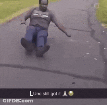 A Man Is Riding A Scooter Down A Road With The Caption Lunc Still Got It GIF