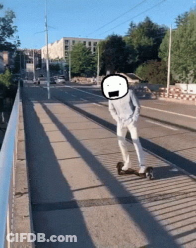 A Man Is Riding A Scooter On A Sidewalk With A Cartoon Face On His Head GIF