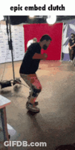 A Man Is Riding A Skateboard In Front Of A Red Backdrop With The Caption Epic Embedded Clutch GIF