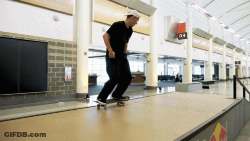 A Man Is Riding A Skateboard On A Ramp With A Sign That Says D4 On It GIF