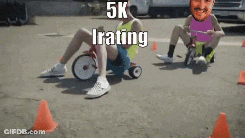 A Man Is Riding A Tricycle With The Words 5K Irating Written On It GIF