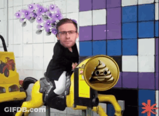 A Man Is Riding A Yellow Horse With A Can Of Poop In The Back GIF