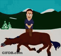 A Man Is Riding On The Back Of A Dead Horse GIF