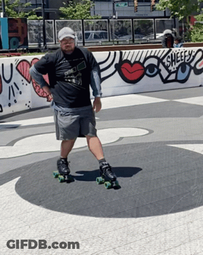 A Man Is Rollerblading In Front Of A Wall That Says Sheefs GIF