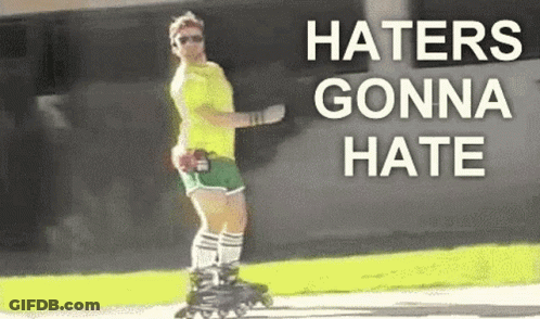 A Man Is Rollerblading On A Sidewalk With The Words `` Haters Gonna Hate '' Written On The Bottom . GIF