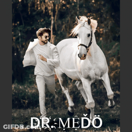 A Man Is Running Behind A White Horse With The Name Dr Medo On The Bottom GIF