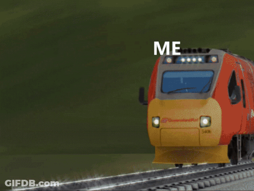 A Man Is Running In Front Of A Train That Says Me On The Bottom GIF