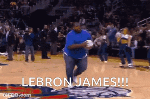 A Man Is Running On A Basketball Court With The Words Lebron James !!! Behind Him GIF