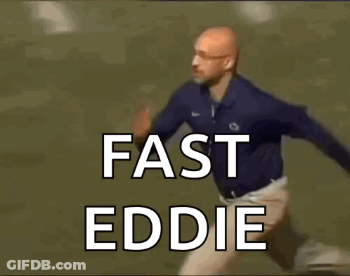 A Man Is Running On A Field And The Words Fast Eddie Are On The Screen GIF