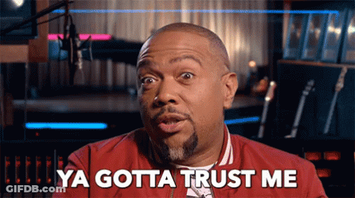 A Man Is Saying Ya Gotta Trust Me In Front Of A Microphone GIF