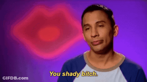 A Man Is Saying You Shady Bitch In Front Of A Pink Heart . GIF