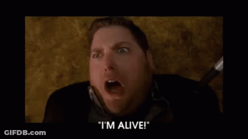 A Man Is Screaming And Saying `` I 'M Alive '' In A Movie . GIF