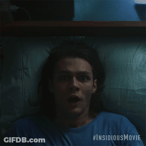 A Man Is Screaming In A Blue Shirt With #Insidiousmovie Written On The Bottom GIF
