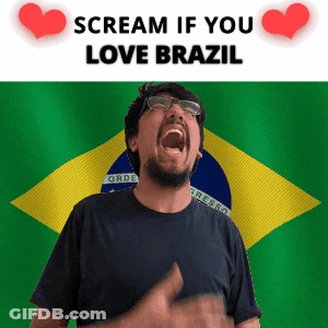 A Man Is Screaming In Front Of A Brazilian Flag GIF