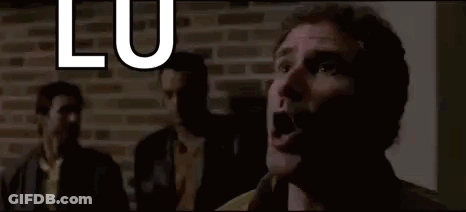 A Man Is Screaming In Front Of A Brick Wall With The Words `` Flu , You 'Re My Boy '' . GIF
