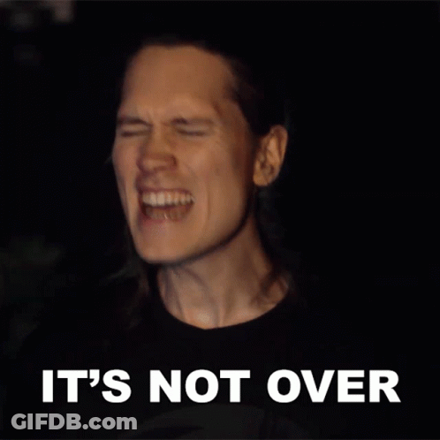 A Man Is Screaming With The Words " It 'S Not Over " Behind Him GIF