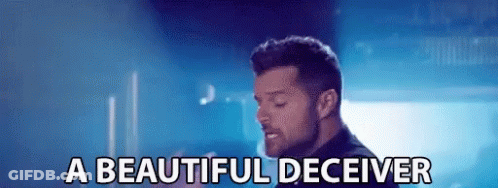 A Man Is Singing A Song And The Words A Beautiful Deceiver Are Next To Him GIF
