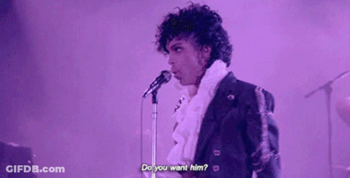 A Man Is Singing Into A Microphone And Asking Do You Want Him . GIF