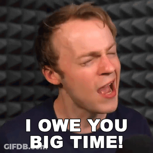 A Man Is Singing Into A Microphone And Saying I Owe You Big Time GIF