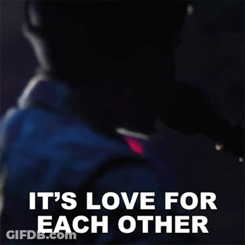 A Man Is Singing Into A Microphone And The Words It 'S Love For Each Other Are Visible GIF