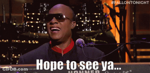 A Man Is Singing Into A Microphone With The Words Hope To See Ya GIF