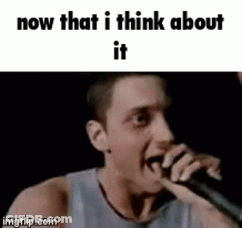 A Man Is Singing Into A Microphone With The Words `` Now That I Think About It '' Written Below Him . GIF