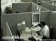 A Man Is Sitting At A Desk In Front Of A Computer With The Words `` Me Right Now '' Written Above Him . GIF