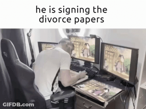 A Man Is Sitting At A Desk Playing A Video Game With The Words He Is Signing The Divorce Papers Above Him GIF